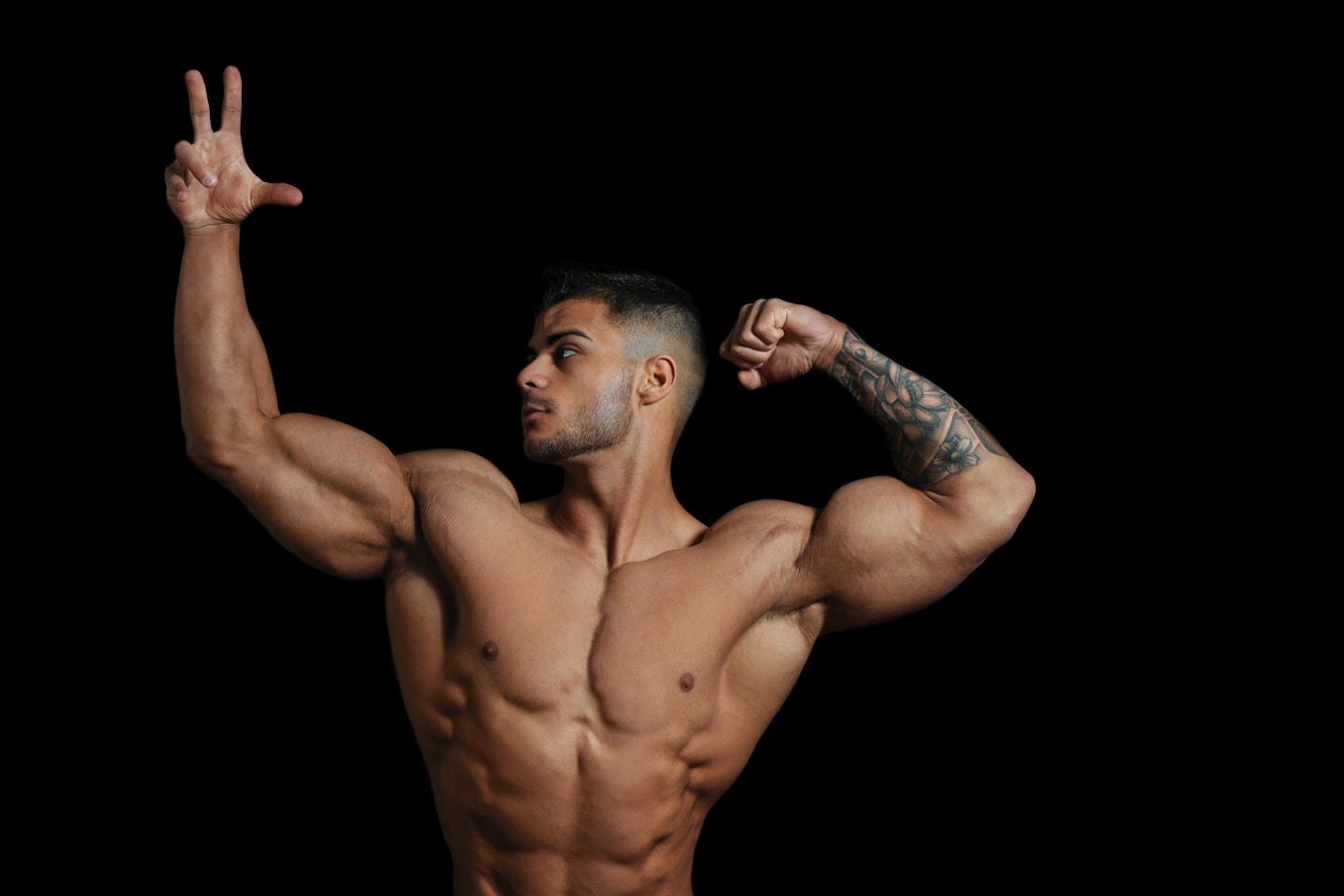topless man with hands up